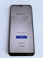Front view of phone booted to initial welcome screen