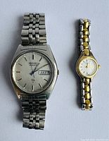 Both Seiko and Bulova watches side by side showing overall condition and design.