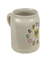 Front view of vintage ceramic German beer stein showing multiple colored regional crests and single handle.