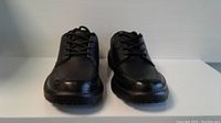 Front view of black Dr. Comfort Eric men's shoes size 9.5, showing lace-up moc toe design.