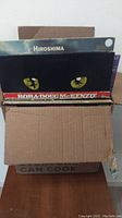 Box of LP records with visible album covers including Hiroshima, Bob & Doug McKenzie