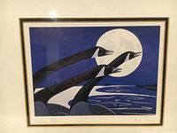 Close-up of the print showing two black birds with the full moon in the background, labeled "Calling Blues" and signed by Rick Beaver.