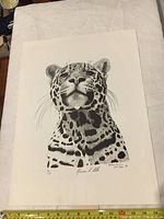 Full view of the lithograph showing the entire print and artwork of the leopard portrait.