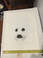 Full view of the lithograph print on white background with measuring tape indicating size, showing the entire artwork and paper edges.