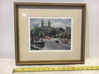 Framed limited edition print with measuring tape showing size, 15" x 13" with image size 9" x 7".