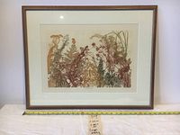 Framed large etching artwork shown front on with measuring tape below to show scale.