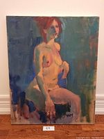Photo showing full 16x20 inch painting of a seated nude female with red hair on a blue-green background, signed Nahy.