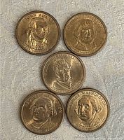 Obverse side showing the portrait side of the five coins with presidents John Adams, Thomas Jefferson, William Henry Harrison, and George Washington.