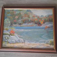 Full frontal view of the framed painting showing composition and frame