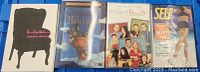 Photo showing four DVDs: Paul Mccartney Memory Almost, Monty Python and the Holy Grail, Modern Family Season 1, Self Exercise DVD