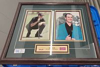 Framed dual portrait set featuring two photos of Mike Weir, one signed in golfing stance and another wearing the Masters green jacket, with a plaque at the bottom inside the wood frame.