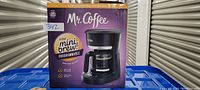 Photo of the boxed Mr. Coffee 5 Cup Mini Brew Programmable Coffee Maker showing front of the packaging with product image and branding.