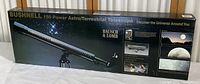 Box image front showing long telescope with scale and Bushnell branding, describing 150 power astro/terrestrial telescope by Bausch & Lomb.