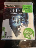 Front cover of the Aliens Colonial Marines PS3 game case showing cover art and store stickers.