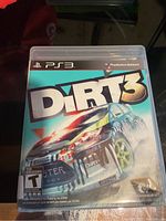 Clear image showing the front cover of DiRT 3 for PlayStation 3, highlighting game title and cover art of racing car.