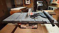 Front view of the Craftsman 8 inch table saw showing the metal table surface, adjustable fence, and control panel with blade size indicated.