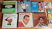 Photo of vintage LP record album covers including Bing Crosby, Dean Martin, Louis Prima, Roger Williams, and others.