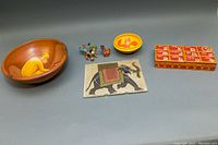 Display photo showing all items in the lot arranged on a gray background.