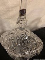 Close-up of German lead crystal covered candy dish with intricate cut glass details and hexagonal lid knob