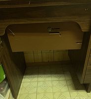 Wooden cabinet base of the Vigorelli sewing machine