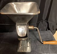 Stainless steel manual tomato passata machine with funnel and crank handle