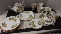 Overview of entire tea set arranged on table