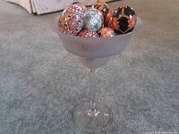 Photo showing the frosted glass compote bowl holding the decorative eggs.