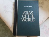 Front cover of the Reader's Digest Atlas of the World showing black hardcover with silver and white text