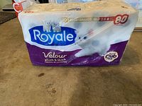 Front view of unopened Royale toilet paper pack 30 rolls with purple and white packaging and kitten image.