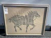 Framed ink block print showing the horse image from front with frame and matting.