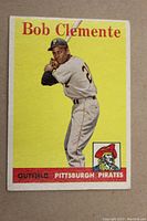 Front of card showing player image, name and team logo