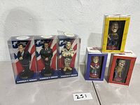 Seven hand painted action figures in original boxes; three Americas Heroes and four Pep Boys limited edition figurines