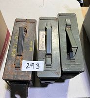 Top view of three ammo cans showing handles and lids