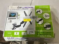 Box of Atlantic L-Motion spring arm TV mount showing brand, model, and supported TV size and weight. The box indicates compatibility with 23-60 inch TVs and weights 11-66 lbs.