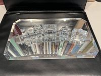 Train set arranged on beveled mirror base, full front view