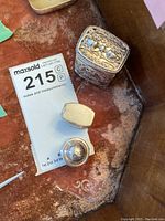 Three cases arranged on surface with measuring card