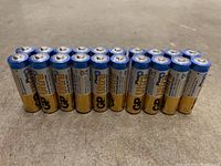 20 AA GP Ultra Plus alkaline batteries lined up upright, showing front and side branding.