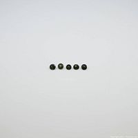 Front view of five small round green tourmaline gemstones aligned horizontally on a white surface.