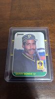 Front of Barry Bonds rookie card showing player image and details