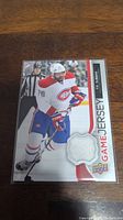 Front of P.K. Subban game jersey hockey card showing player image and embedded jersey swatch.