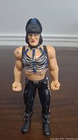 Front view of WWE Chyna figure showing outfit details and facial features.
