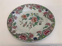 Full view of the Vintage Spode New Stone floral plate showing the entire floral pattern on white ceramic.
