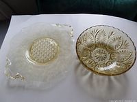 View of both the sandwich tray and yellow glass bowl side by side showing color and patterns