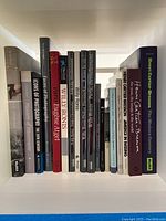 Full shelf view showing all fourteen volumes