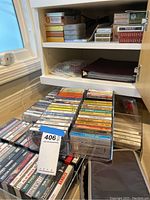 Clear plastic stacking cassette tape storage trays filled with assorted cassette tapes