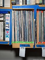 Shelf of jazz LPs with green edge labels