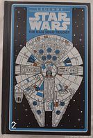 Front cover of the hardcover book showing full design with Millennium Falcon illustration and series title.