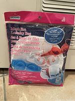 Front packaging of Richard mesh bra laundry bag showing product use and features