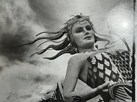 Close up of the mermaid statue in black and white.