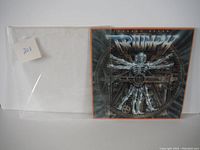 Protective clear plastic jacket on Thunder Seven album with a white inner sleeve labeled '203'.